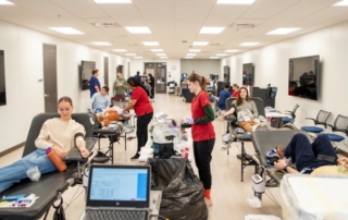 KansasCOM sudents, faculty and staff donate blood for Martin Luther King Jr. Day's National Day of Service.