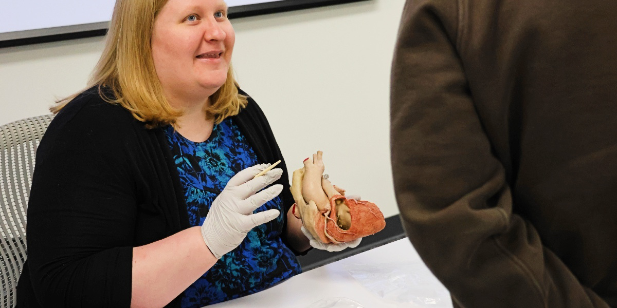 Curran holds heart.