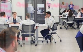 KansasCOM students apply clinical skills in a research setting.
