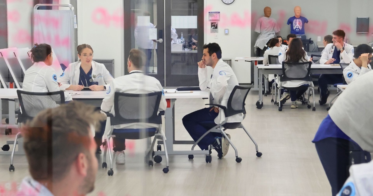 KansasCOM students apply clinical skills in a research setting.